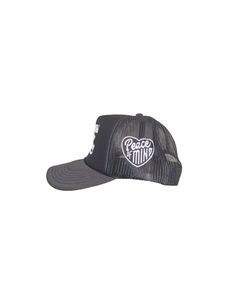 World Needs Healing Trucker Hat